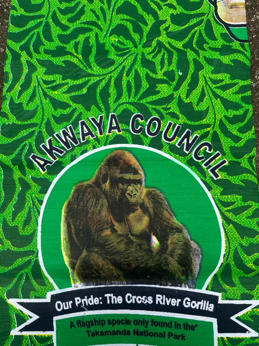 Green Ankara print with council name and gorilla emblem