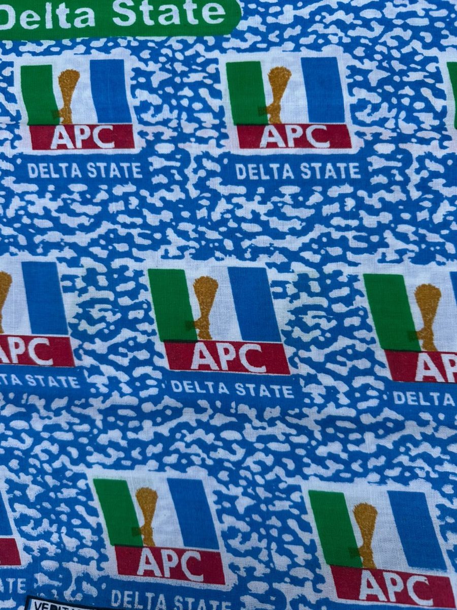 Blue Ankara print with a repeating logo